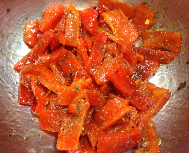 Lardons of red pepper mixed with olive oil and seasonings.