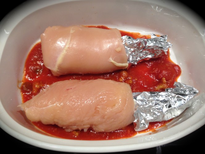 Put sauce on the bottom of the dish before adding the roll ups