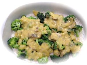 The first layer of rice, broccoli and 1/3 of the soup mixture.