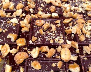 Chocolate squares and peanuts layered in the center of the batter