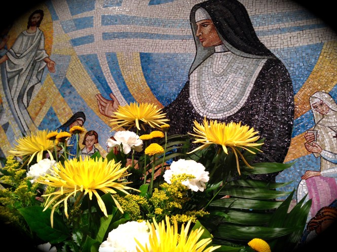 The mural behind the sarcophagus...