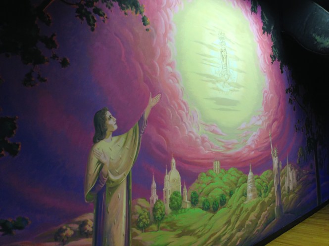 Sister's Mercede's mural on the back wall of the auditorium