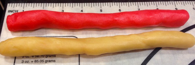 Roll each color of dough into 9 inch logs...