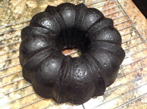 Baked cake from pan dusted with cocoa powder...