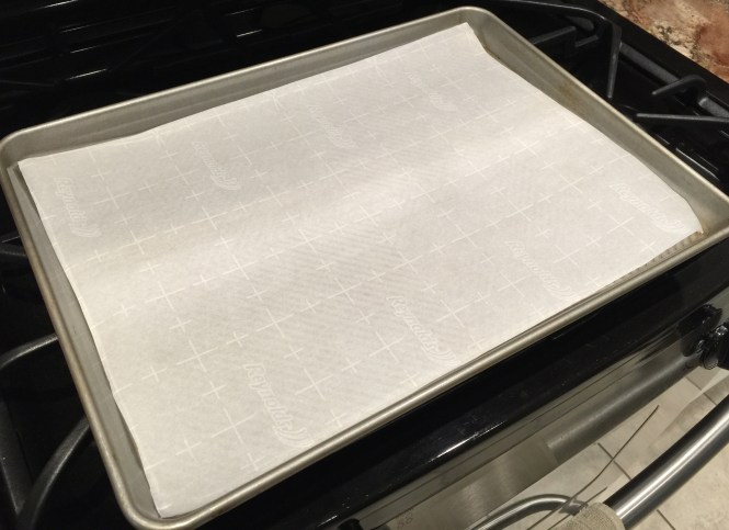 parchment paper lined baking sheet