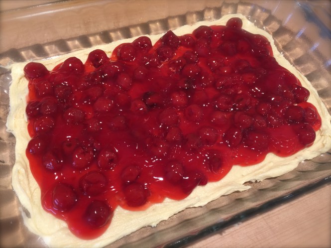 Adding the cherry pie filling