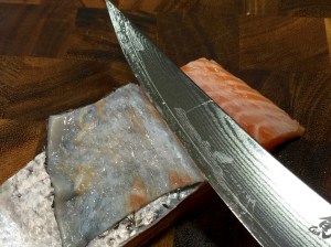 Remove the skin from the salmon